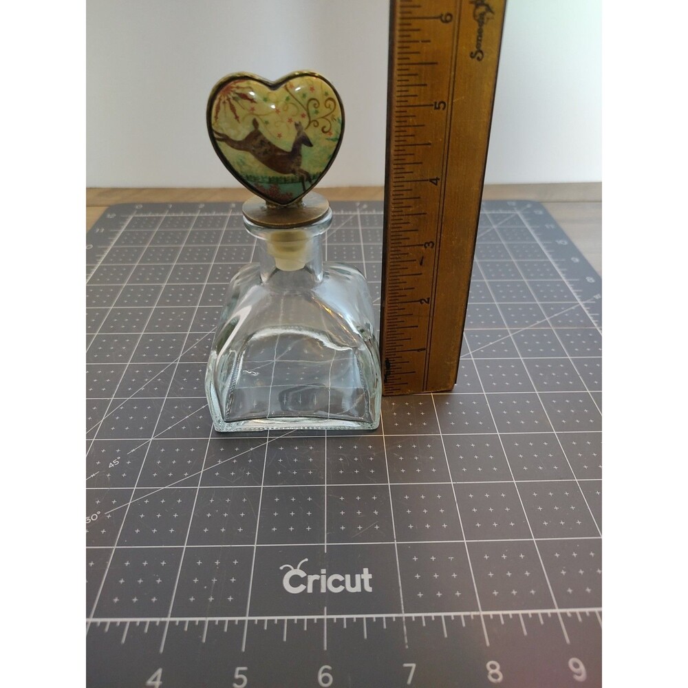 Clear Glass Bottle with Ceramic Jumping Deer Stopper 5 1/2” Tall